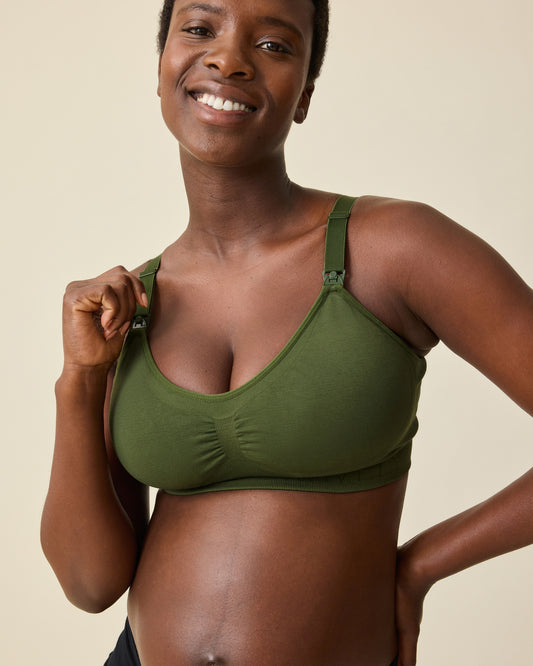 Model is wearing Simply Sublime® Nursing Bra in Deep Olive on a beige background. @model_info:Anna is wearing a Busty Small.