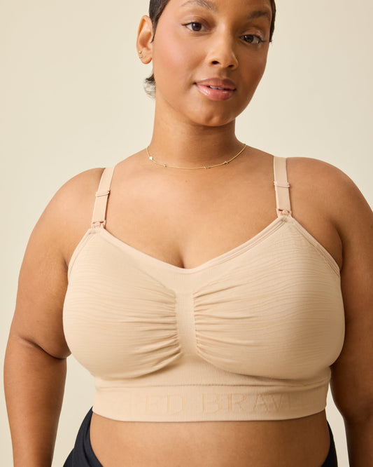 Model wearing the Sublime® Hands-Free Pumping & Nursing Bra in Beige.@model_info:Brittany is wearing an X-Large.