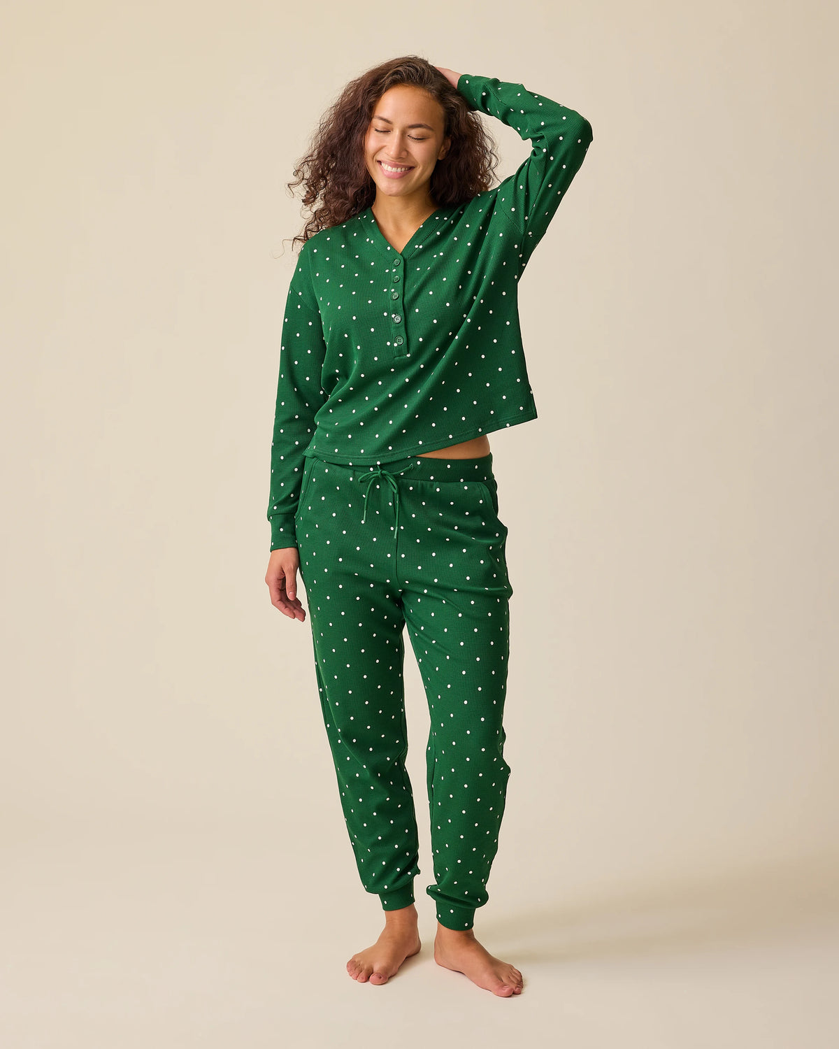 Model is wearing Waffle Maternity & Nursing Lounge Set in Green Dot on a beige background.@model_info:Sadie is 5'8" and wearing a Medium.