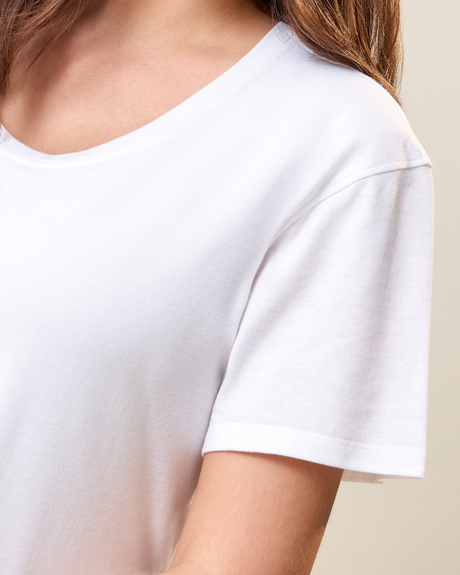 Close up of model wearing Relaxed Cotton Maternity & Nursing T-shirt in White