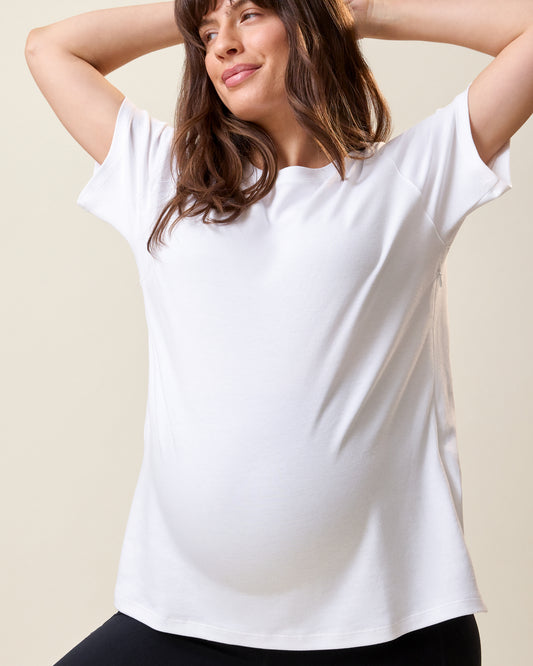 Front view of model wearing Pima Cotton Side Zip Maternity & Nursing T-shirt in White on a neutral background@model_info:KJ is wearing a Medium.