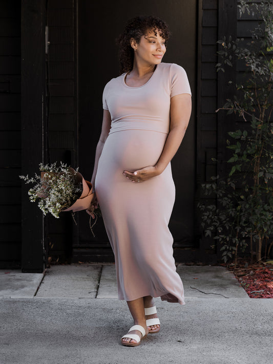 Pregnant model wearing the Olivia Ribbed Bamboo 2-in-1 Maternity & Nursing Dress in Lilac Stone @model_info:Alysha is 7 months pregnant; she is 5'6" and wearing a Large.