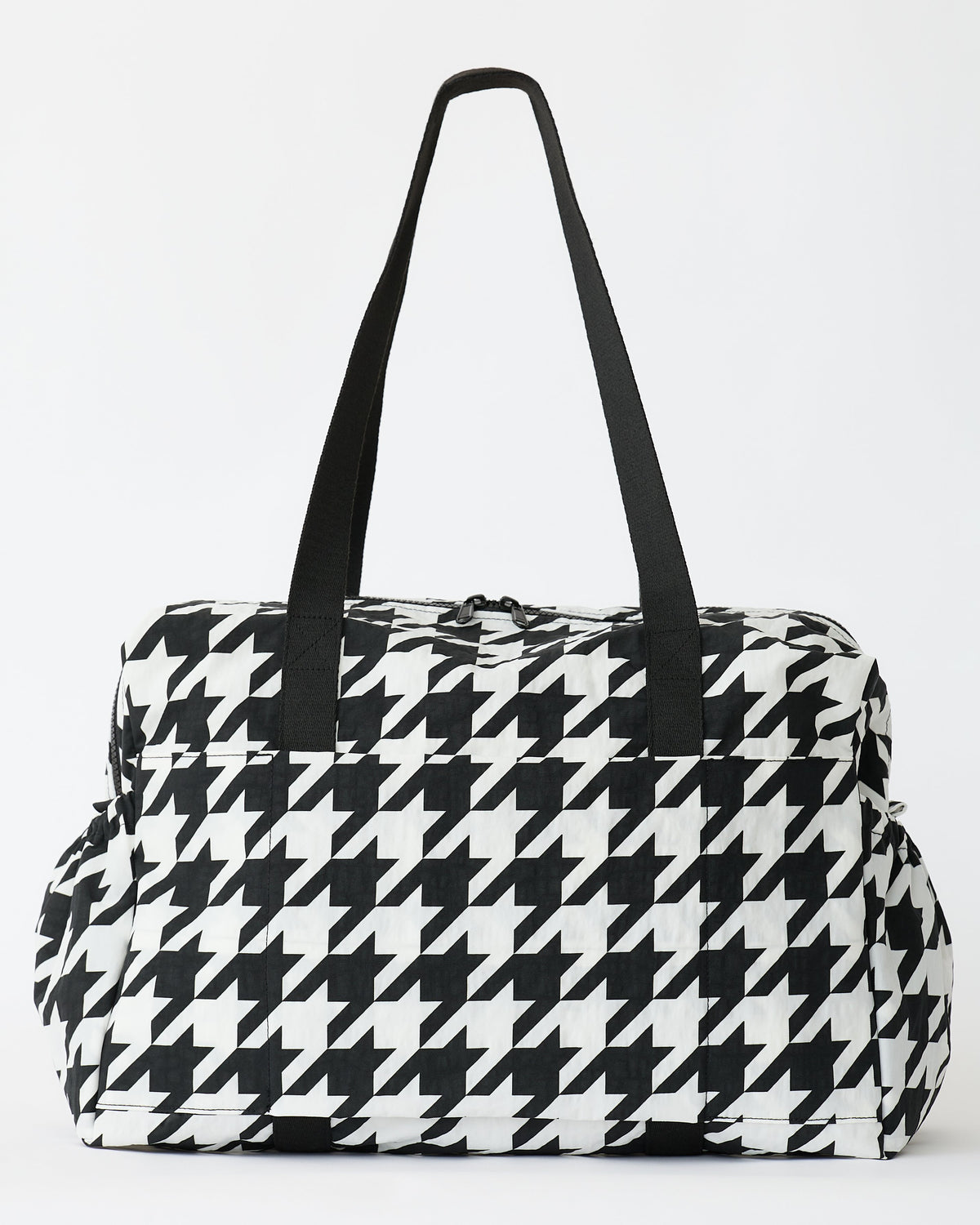 Large Weekender Bag in Black Houndstooth on an off white background.
