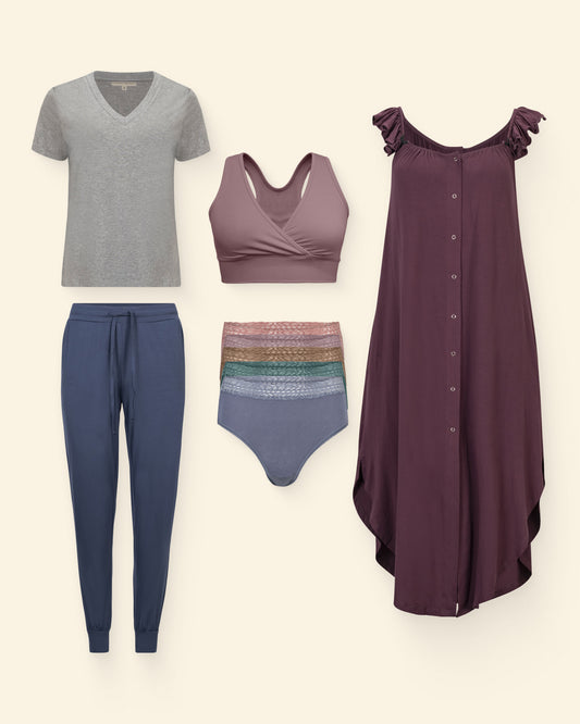 Collection of women's clothing including a gray t-shirt, purple dress, blue pants, and colorful underwear on a white background.