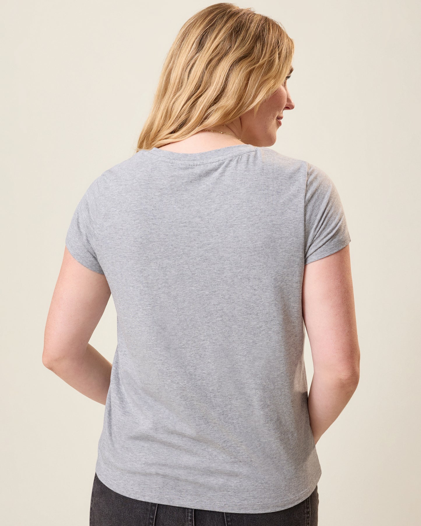 Back view of model wearing the Slim Fit Modal Nursing T-shirt in Grey Heather on a neutral background
