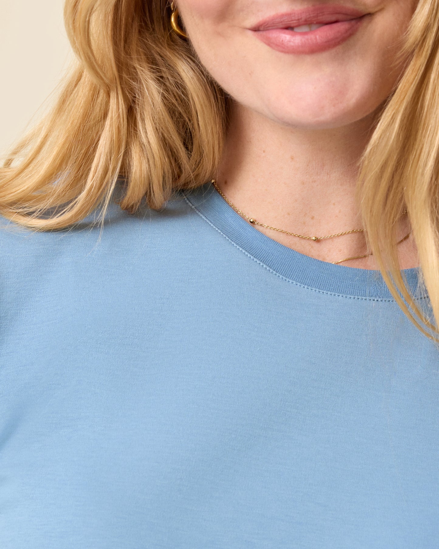 Close up of model wearing Pima Cotton Side Zip Maternity & Nursing T-shirt in Vintage Blue