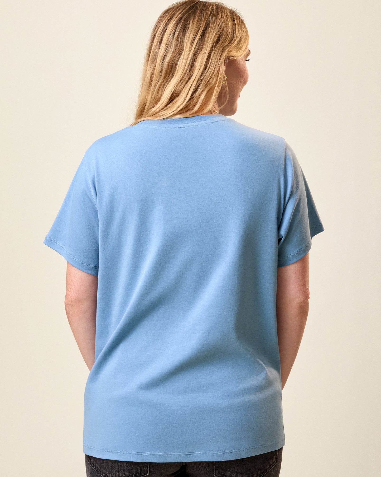 Back view of model wearing Pima Cotton Side Zip Maternity & Nursing T-shirt in Vintage Blue on a neutral background