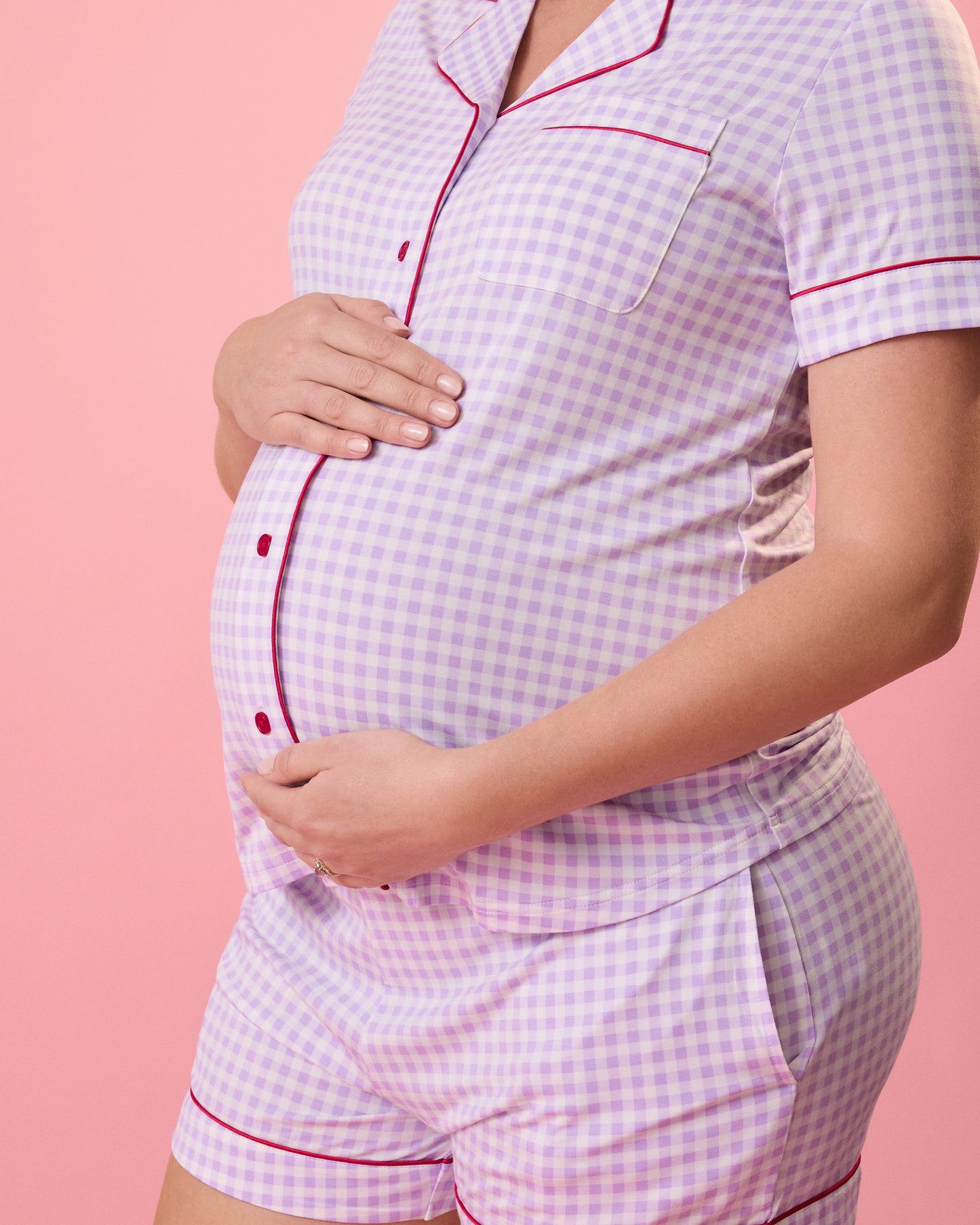 Close up of model wearing Clea Bamboo Short Sleeve Pajama Set in Lavender Gingham