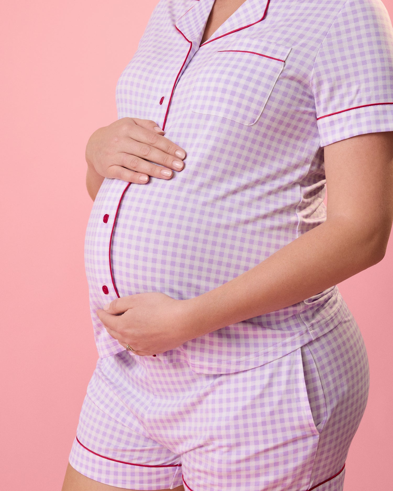 Close up of model wearing Clea Bamboo Short Sleeve Pajama Set in Lavender Gingham