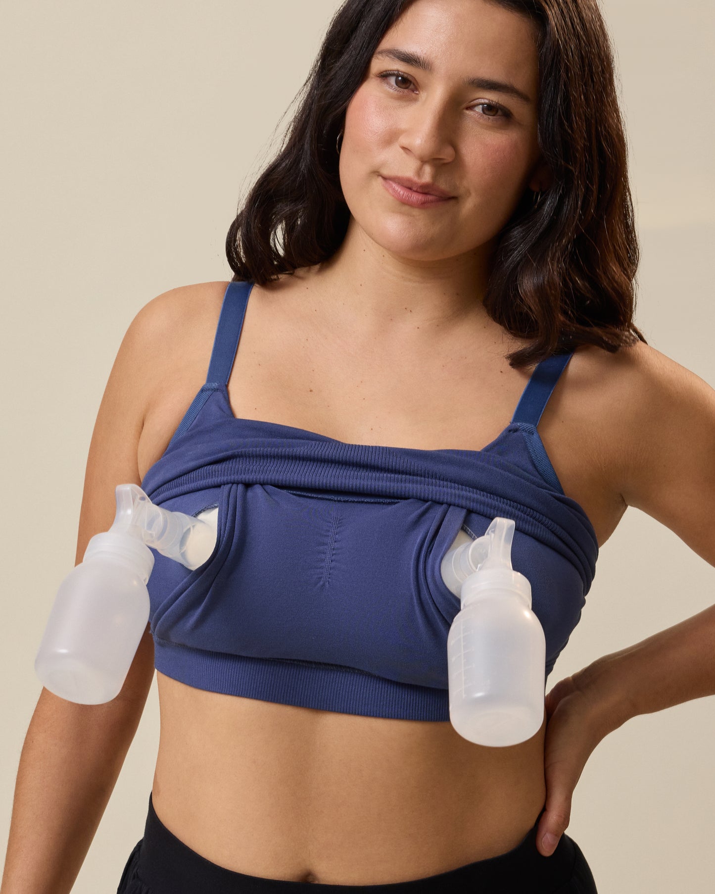 Model wearing Sublime® Bamboo Hands-Free Pumping Lounge & Sleep Bra in Light Navy while pumping