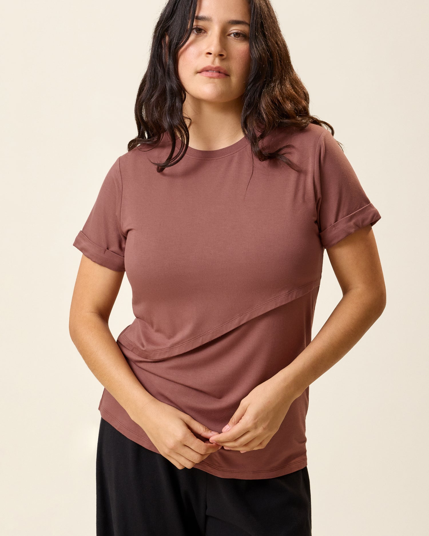 Front view of model wearing the Asymmetrical Nursing T-shirt in Redwood@model_info:Linda is wearing a Small.