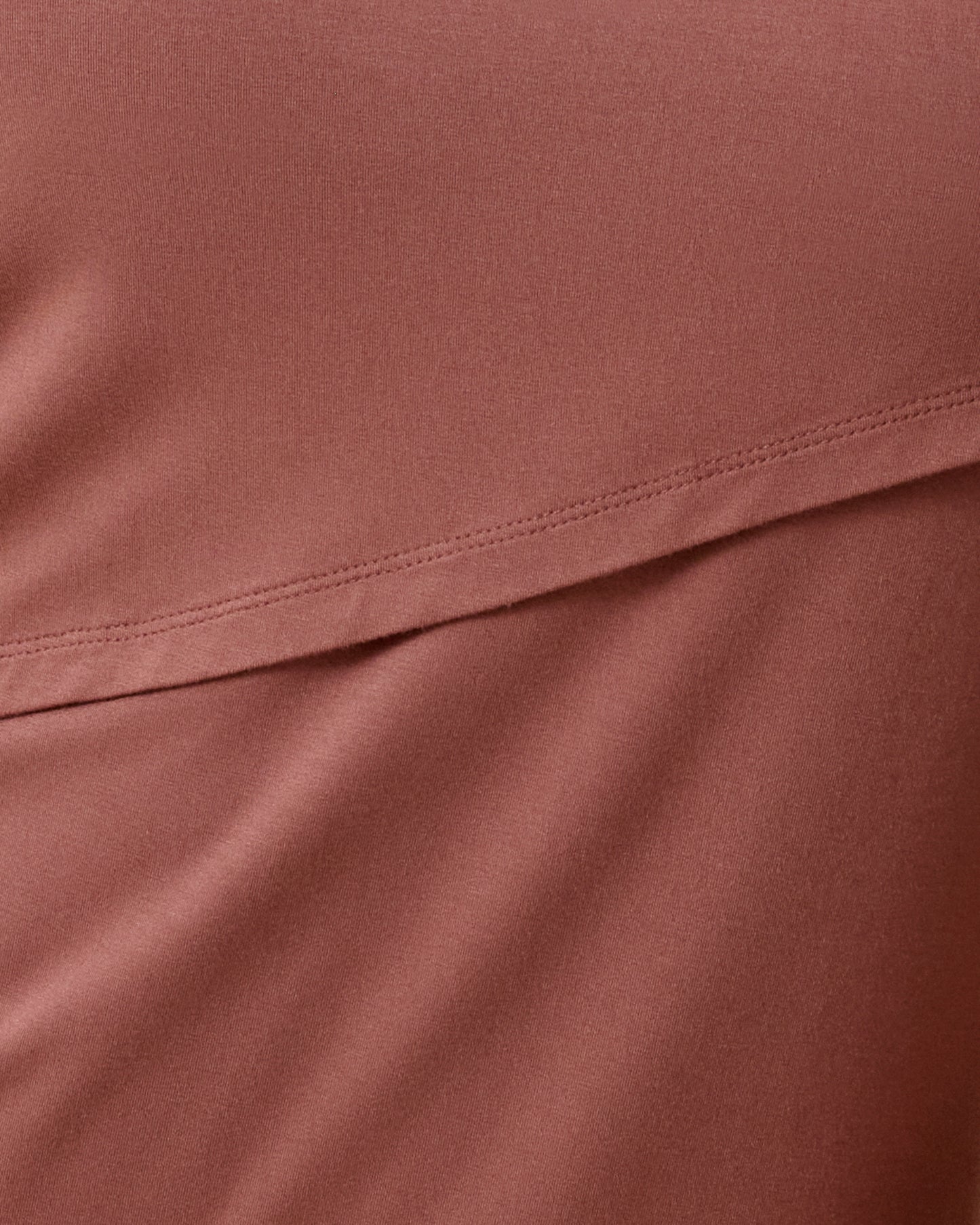 Close up of the Asymmetrical Nursing T-shirt in Redwood