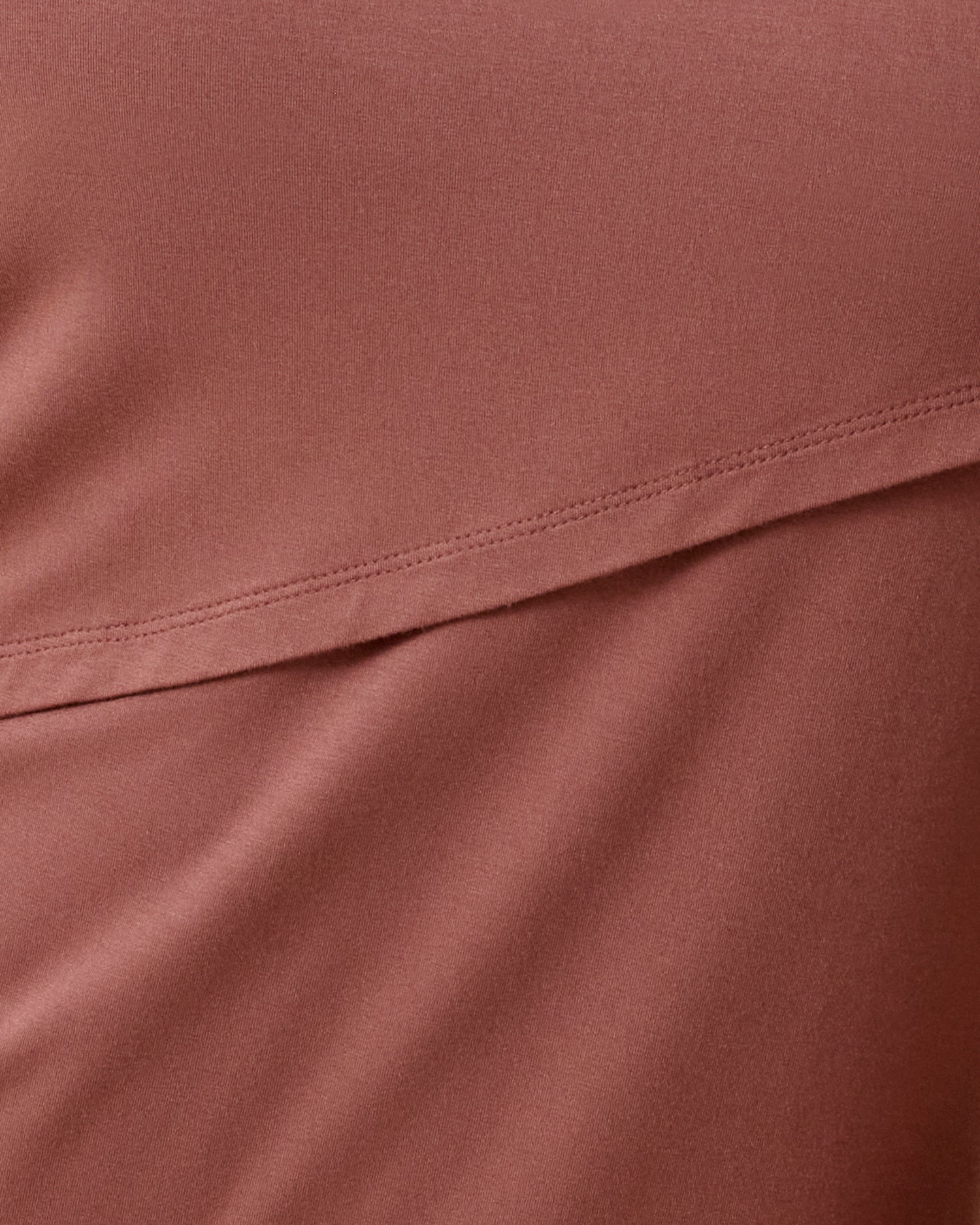 Close up of the Asymmetrical Nursing T-shirt in Redwood