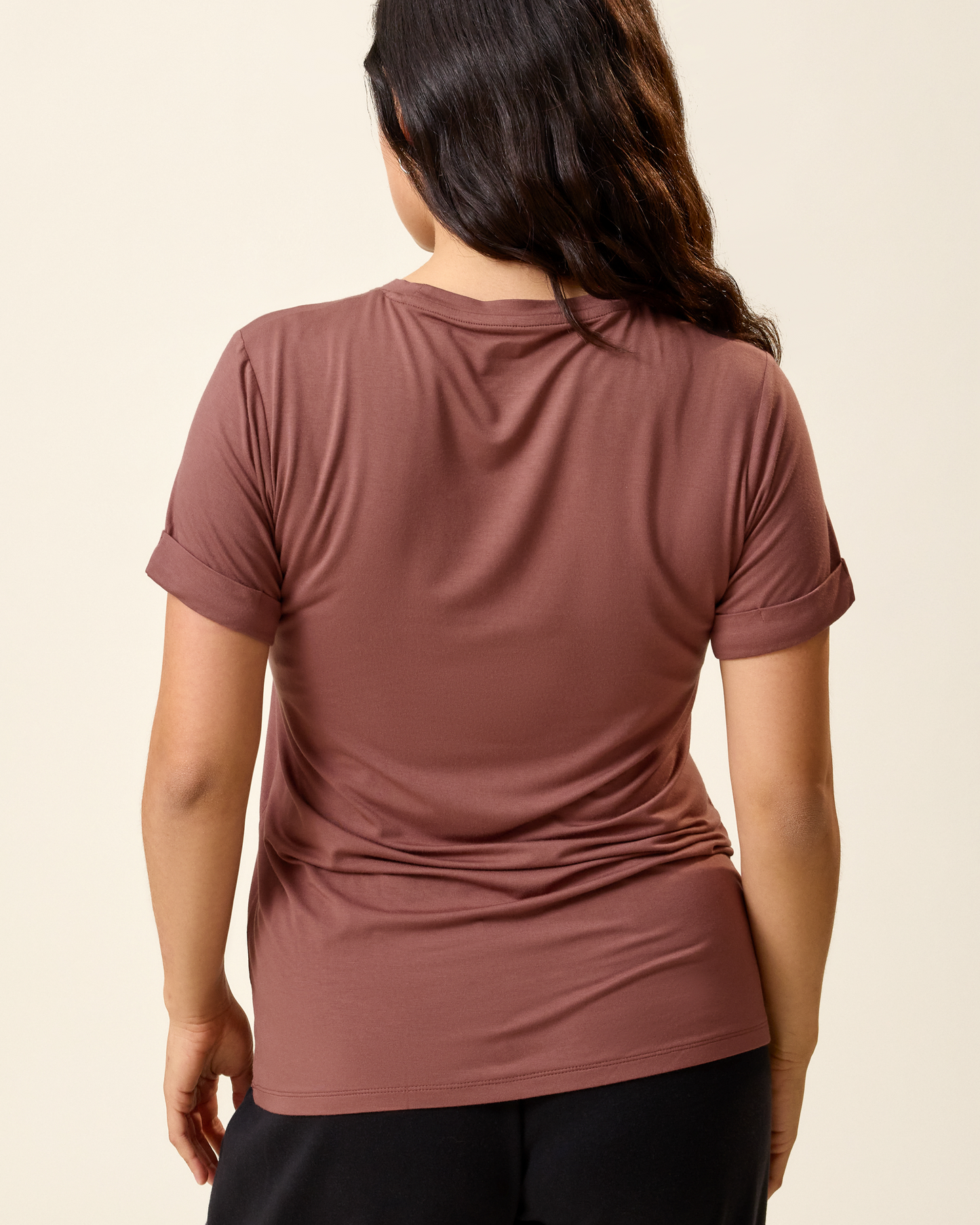 Back view of model wearing the Asymmetrical Nursing T-shirt in Redwood
