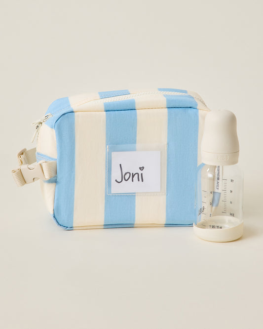 Mini Cooler Bag in Blue Wide Stripe pattern with bottle next to it