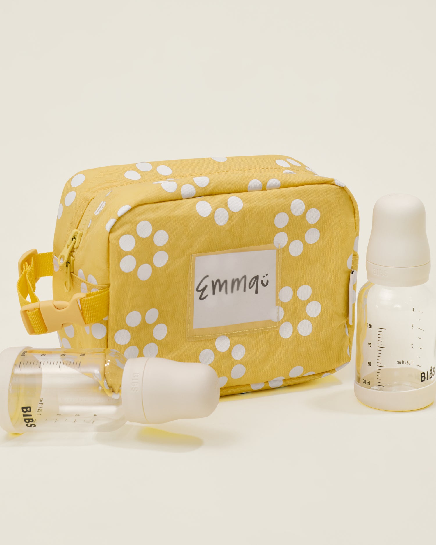 Mini Cooler Bag in the Sunshine Dots print with a name tag 