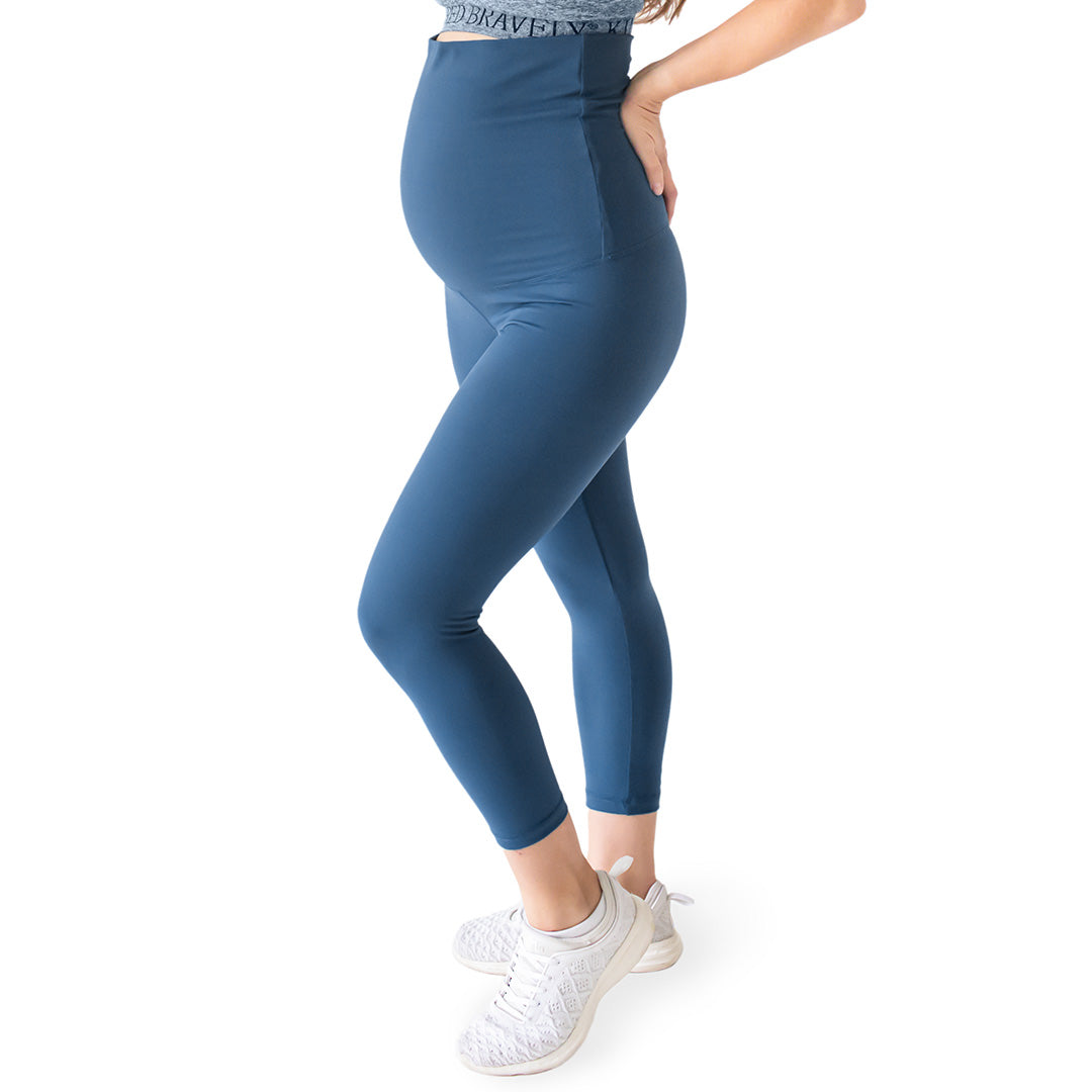 Pregnant model wearing the Martina Maternity & Postpartum Crop Legging | Storm