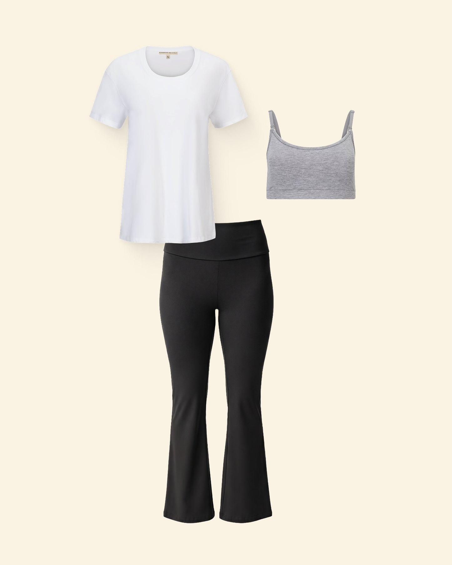 Maternity Essentials, including Bamboo Flex Maternity & Postpartum Flare Pant in Black, French Terry Maternity & Nursing Bralette in Grey Heather and Pima Cotton Side Zip Maternity & Nursing T-shirt in White on a beige background.