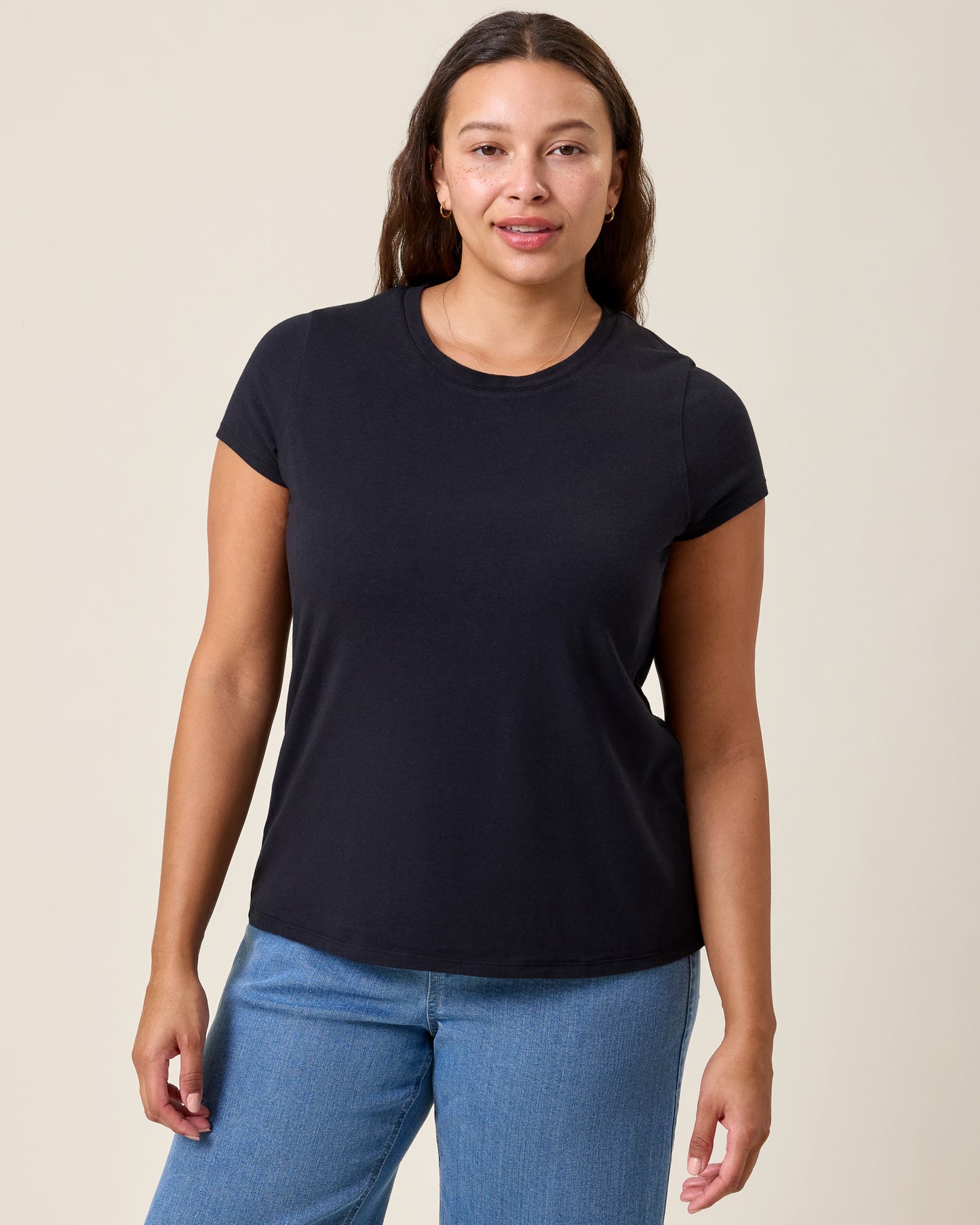 Front view of model wearing Slim Fit Modal Nursing T-shirt in Black on a neutral background@model_info:Alana is wearing a Large.