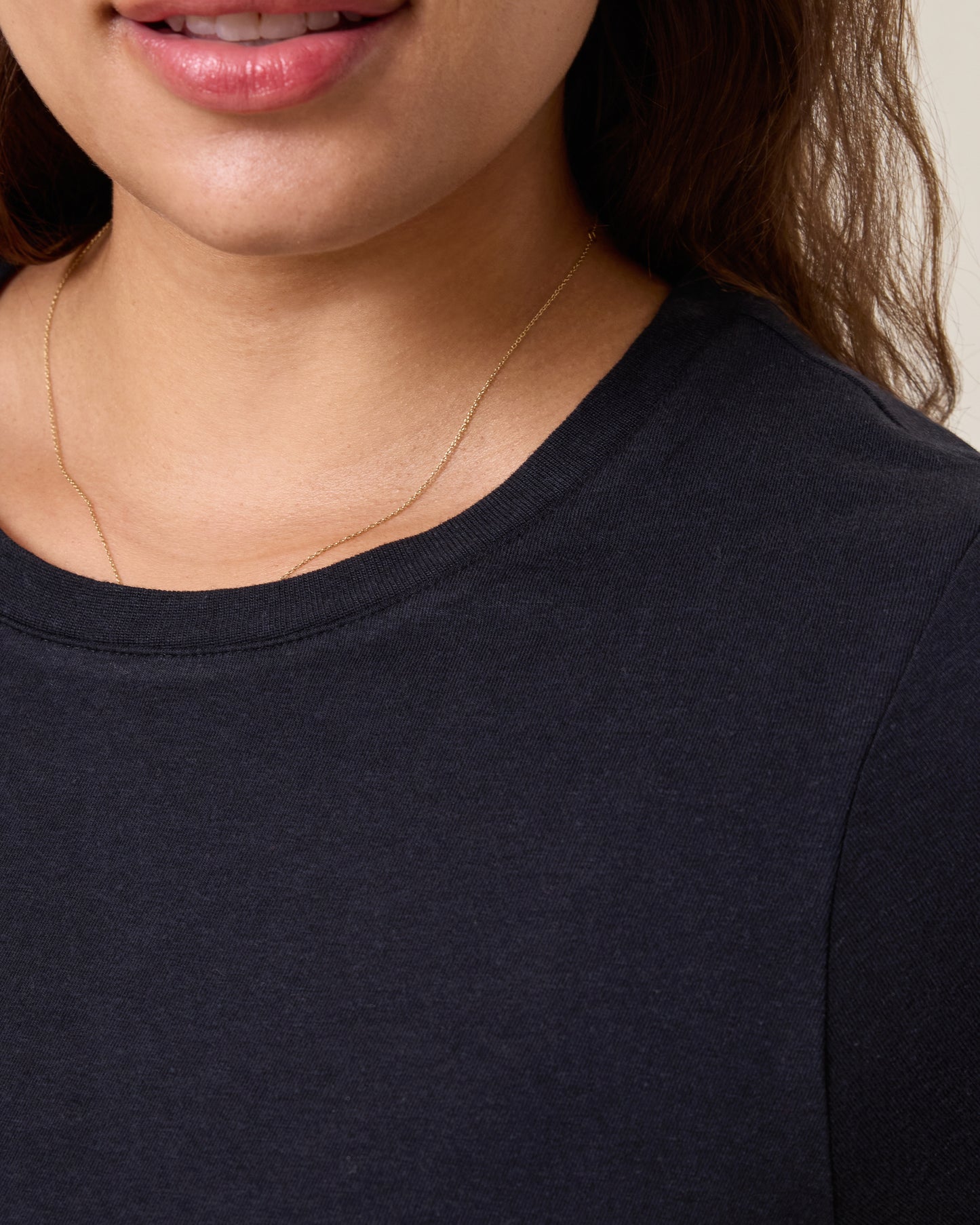 Close up of model wearing Slim Fit Modal Nursing T-shirt in Black