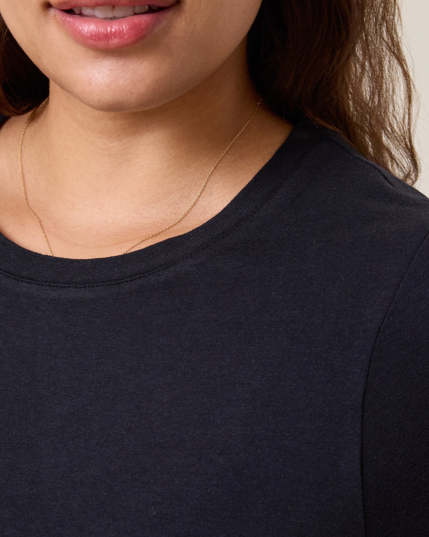Close up of model wearing Slim Fit Modal Nursing T-shirt in Black