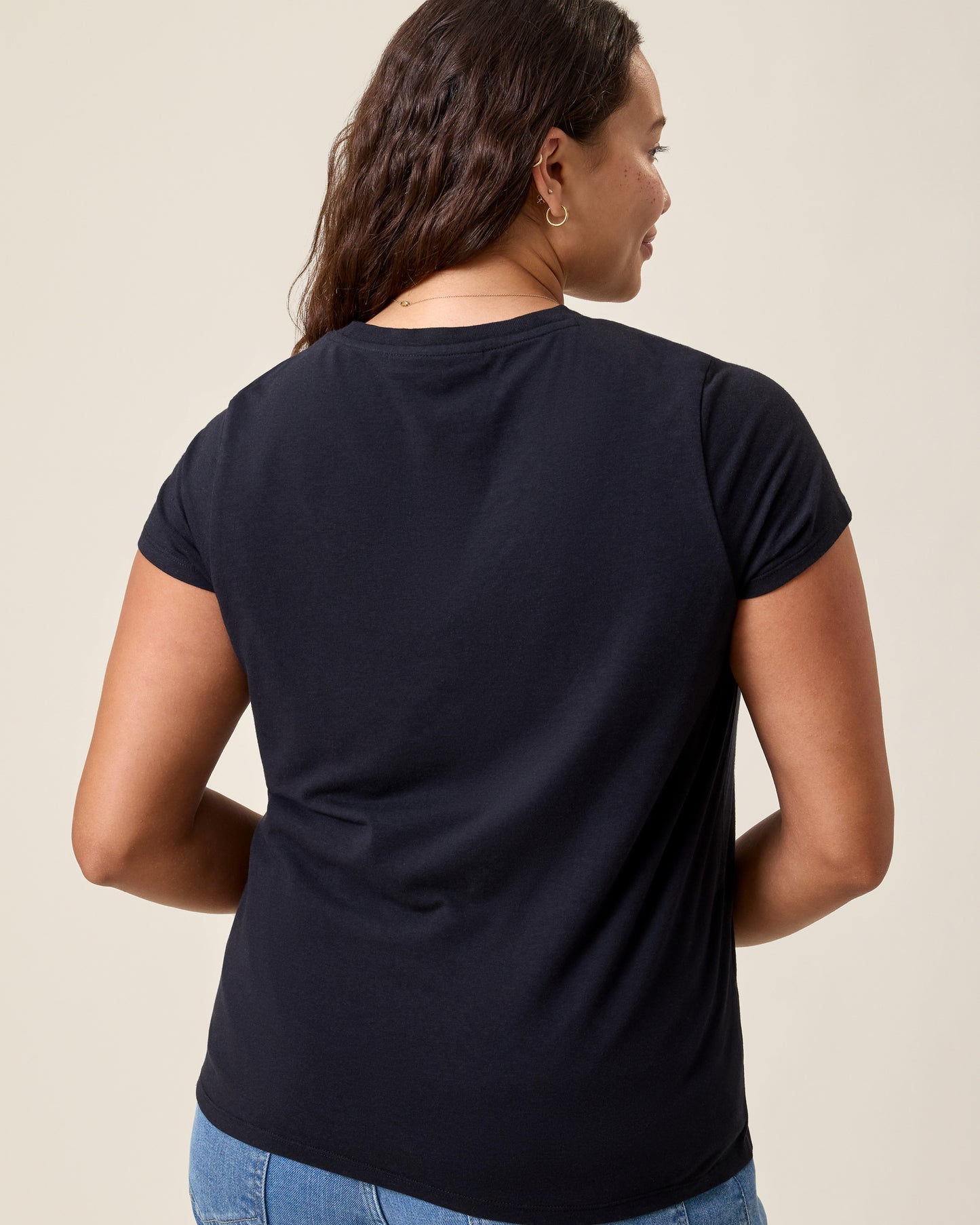 Back view of model wearing Slim Fit Modal Nursing T-shirt in Black on a neutral background