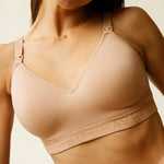 Close up of woman wearing  the Signature Sublime® Contour Hands-Free Pumping & Nursing Bra in Beige