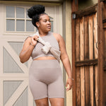 Model wearing the Sublime® Bamboo Maternity & Nursing Longline Bra Top and the Sublime® Bamboo Maternity & Postpartum Bike Short in Taupe.