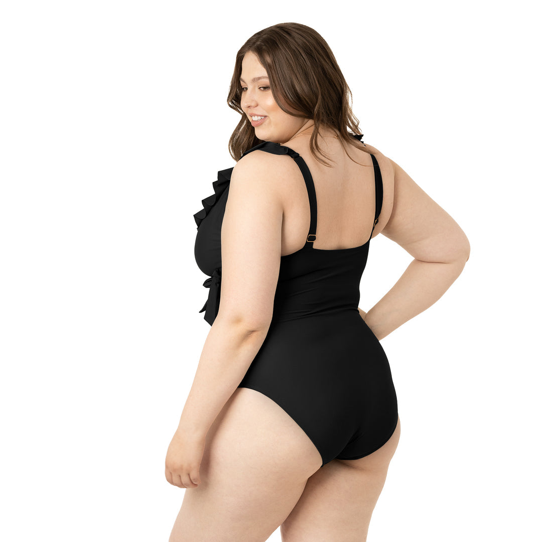 Back view of a model wearing the Ruffle Wrap Maternity & Nursing One Piece Swimsuit in Black