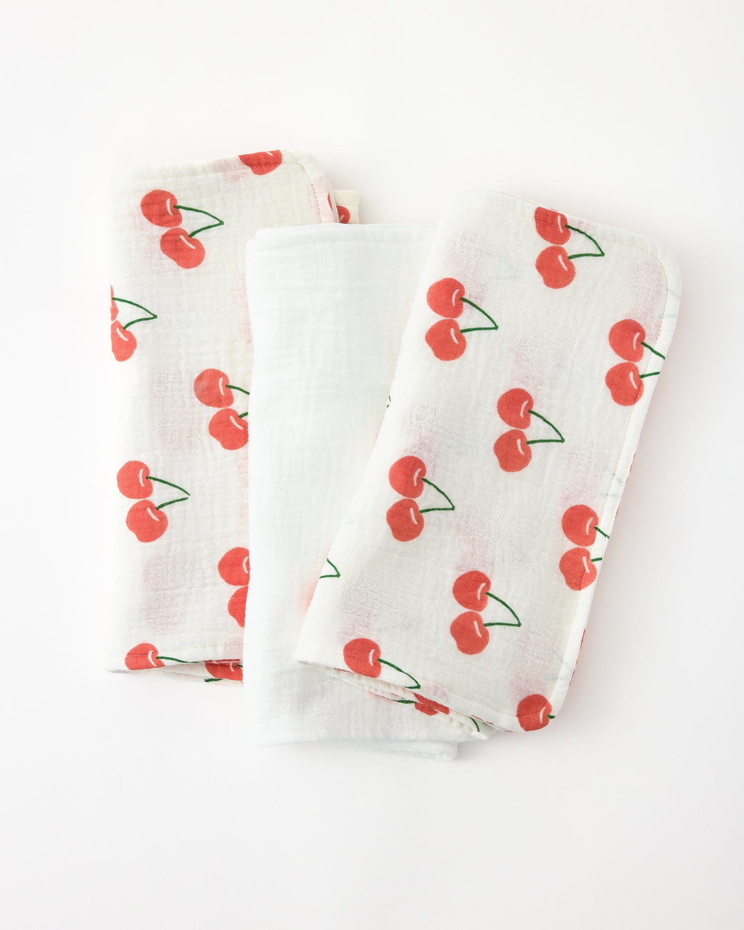 Organic Muslin Burp Cloth (3-Pack) in White Cherries on a white background.