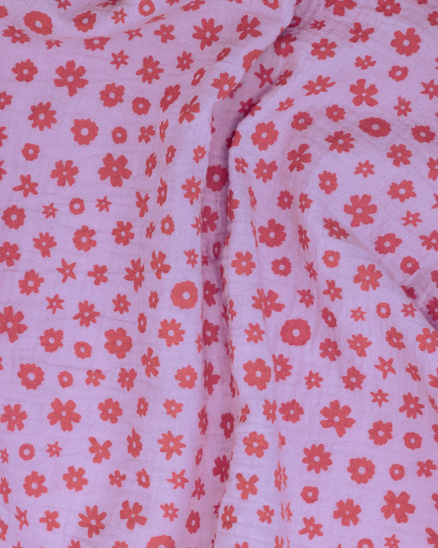 Close up of the Organic Muslin Swaddle in the Lavender Cosmos print.