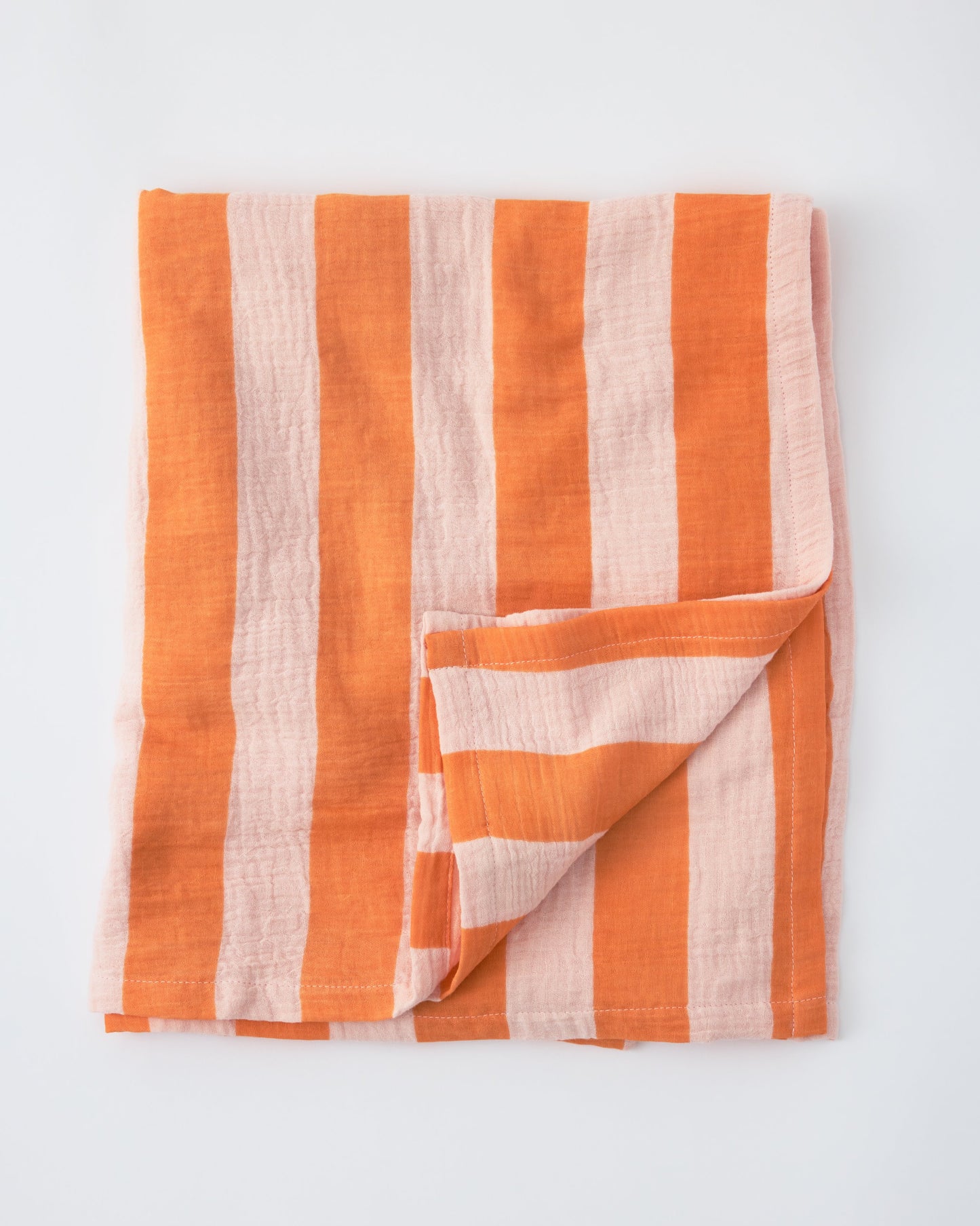 Organic Muslin Burp Cloth (Three-Pack) in Pink Wide Stripe on a beige background.