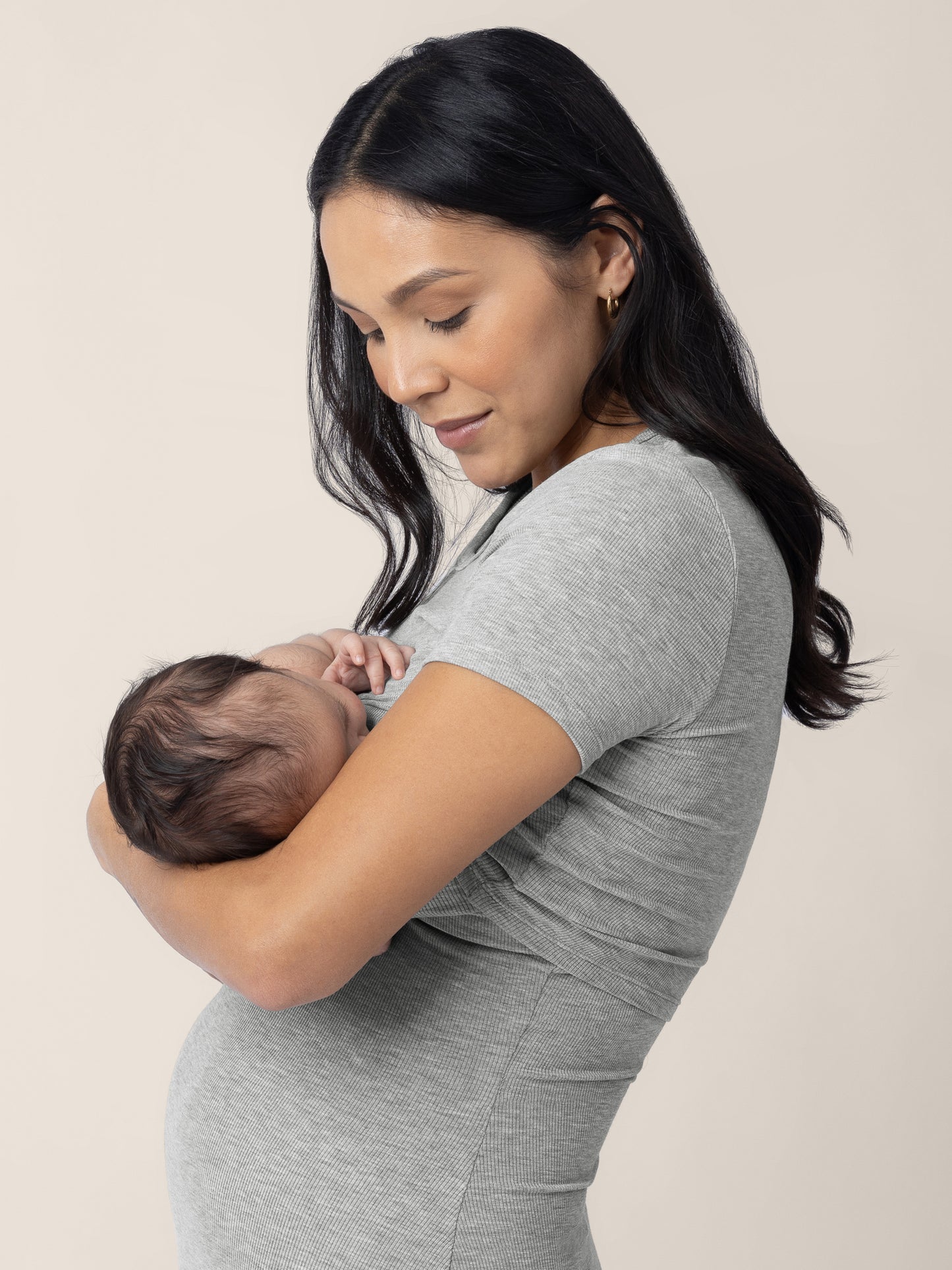 Breastfeeding Model wearing the Olivia Ribbed Bamboo 2-in-1 Maternity & Nursing Dress in Grey Heather
