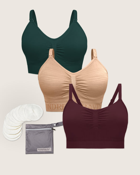 Three sports bras in green, beige, and maroon on a light background