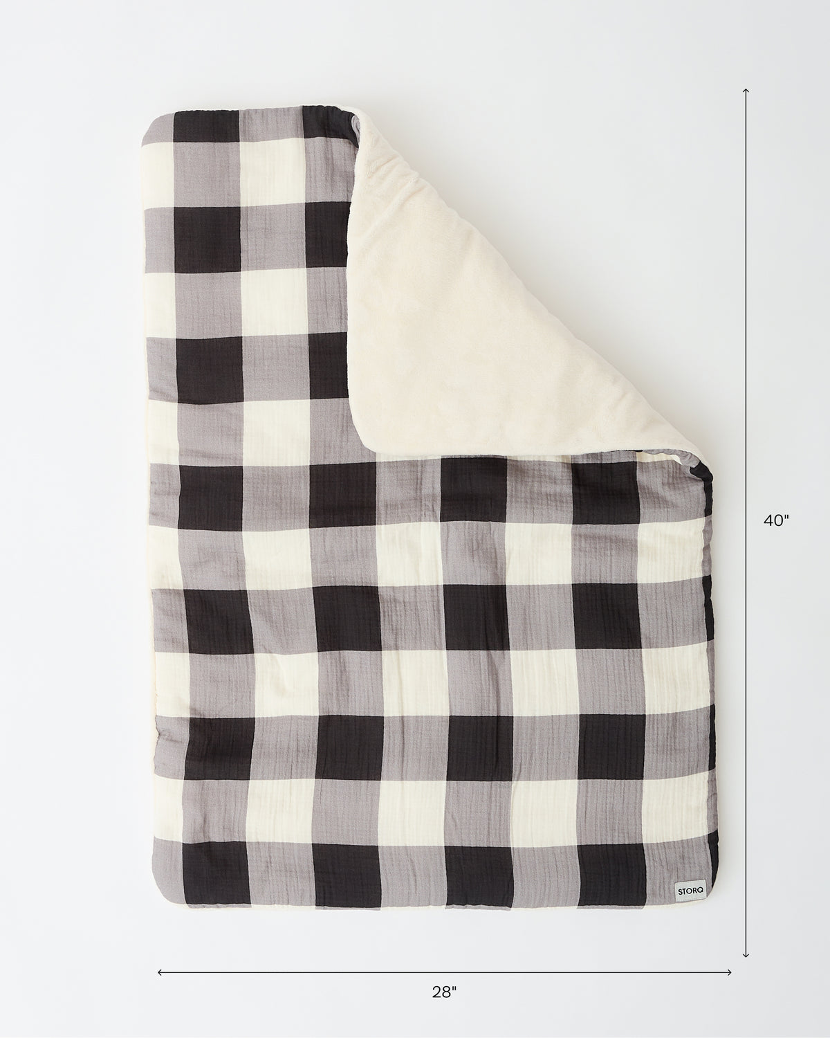 Cozy Stroller Blanket in Buffalo Plaid folded on an off white background with dimensions displaying the item is 28" wide and 40" tall.