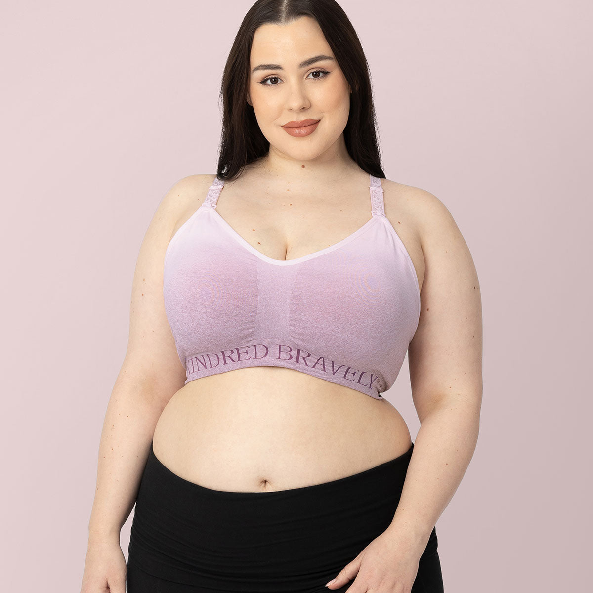 Model wearing the Sublime Hands-Free Pumping Sports Bra in Ombre Purple
