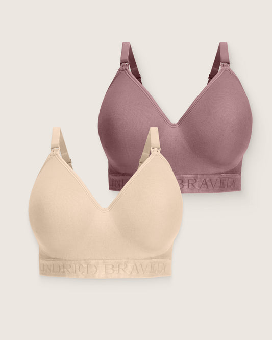 Two bras, one purple and one beige, on a light gray background