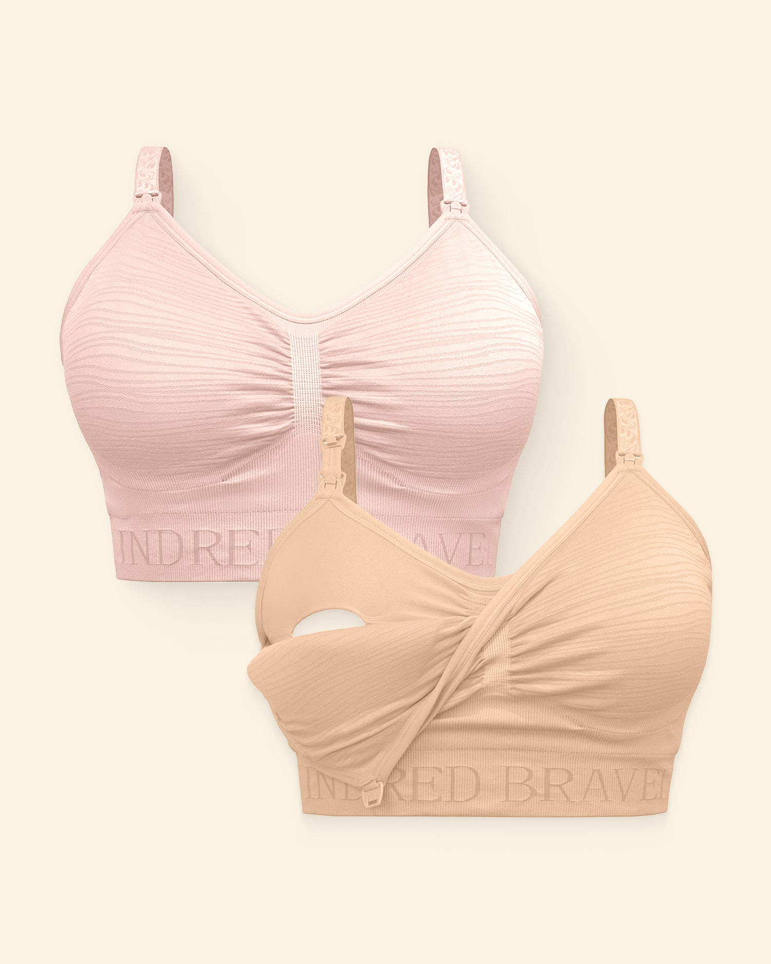 Two bras, one pink and one beige, on a light beige  background