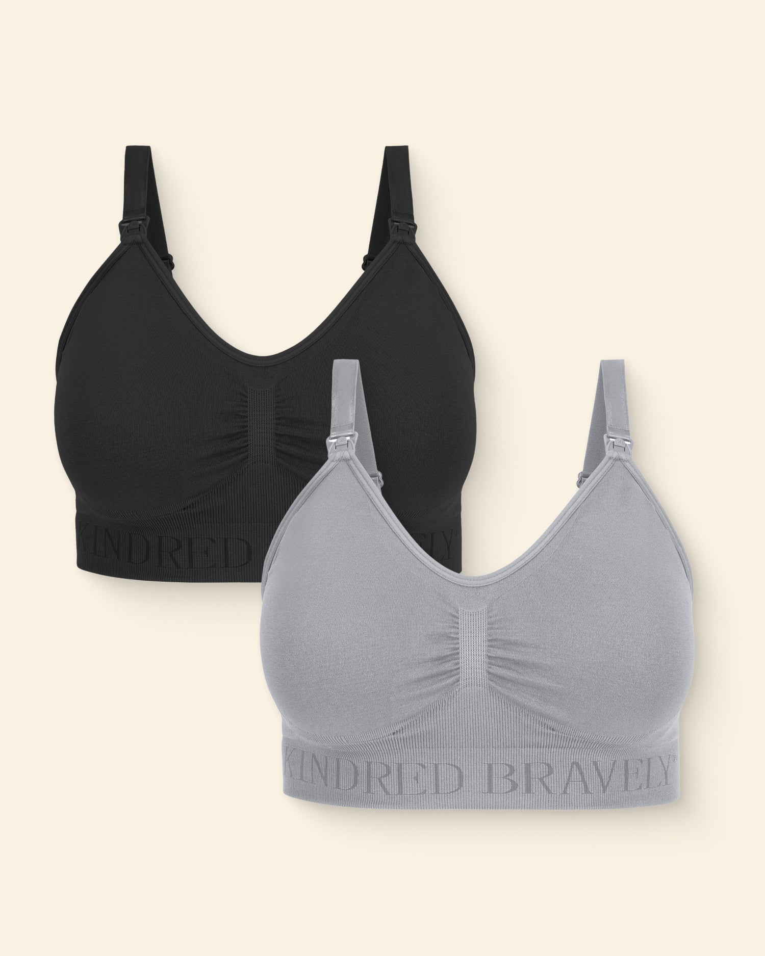 Black and gray bras on a beige background