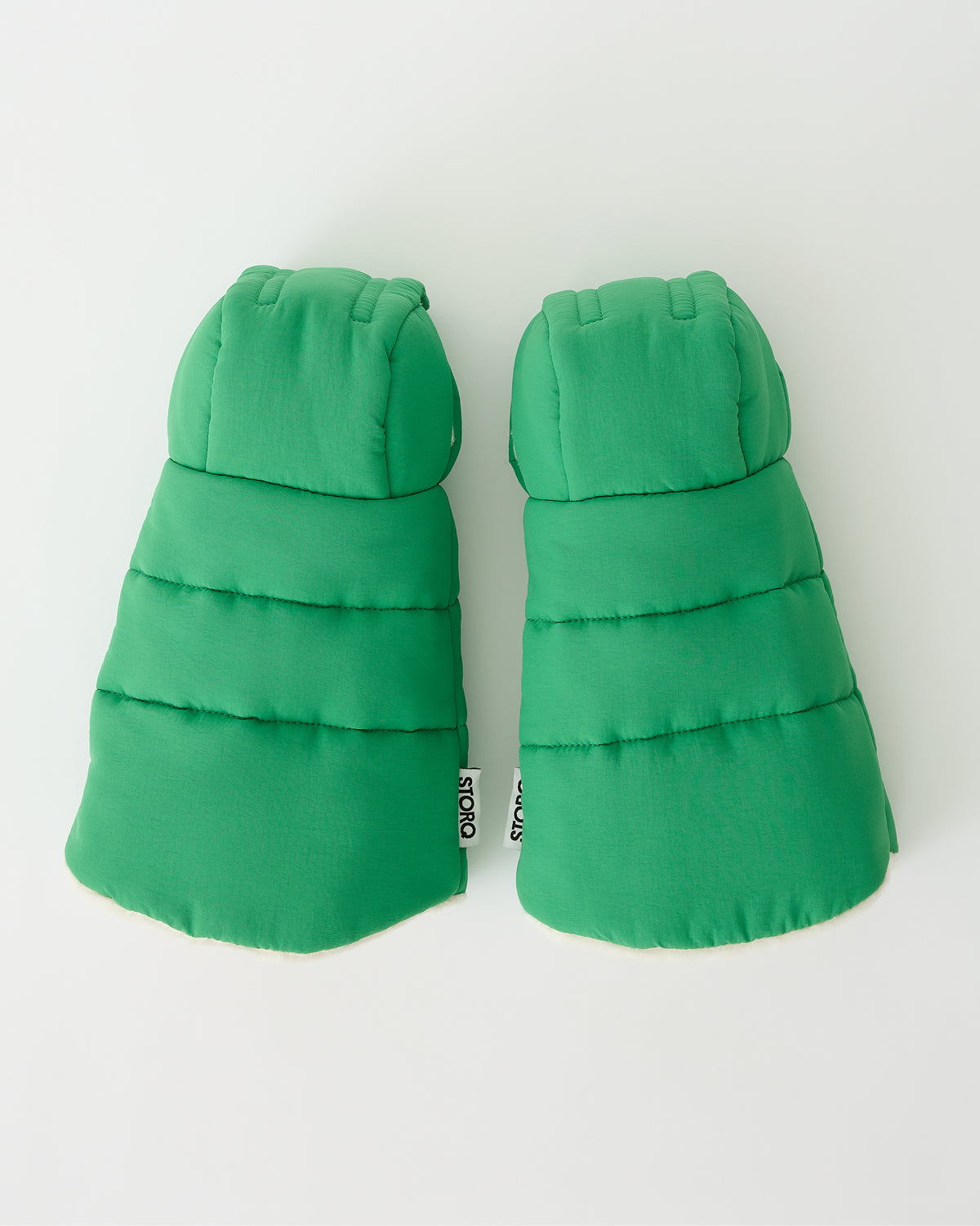 Cozy Stroller Mitts in Green on an off white background.