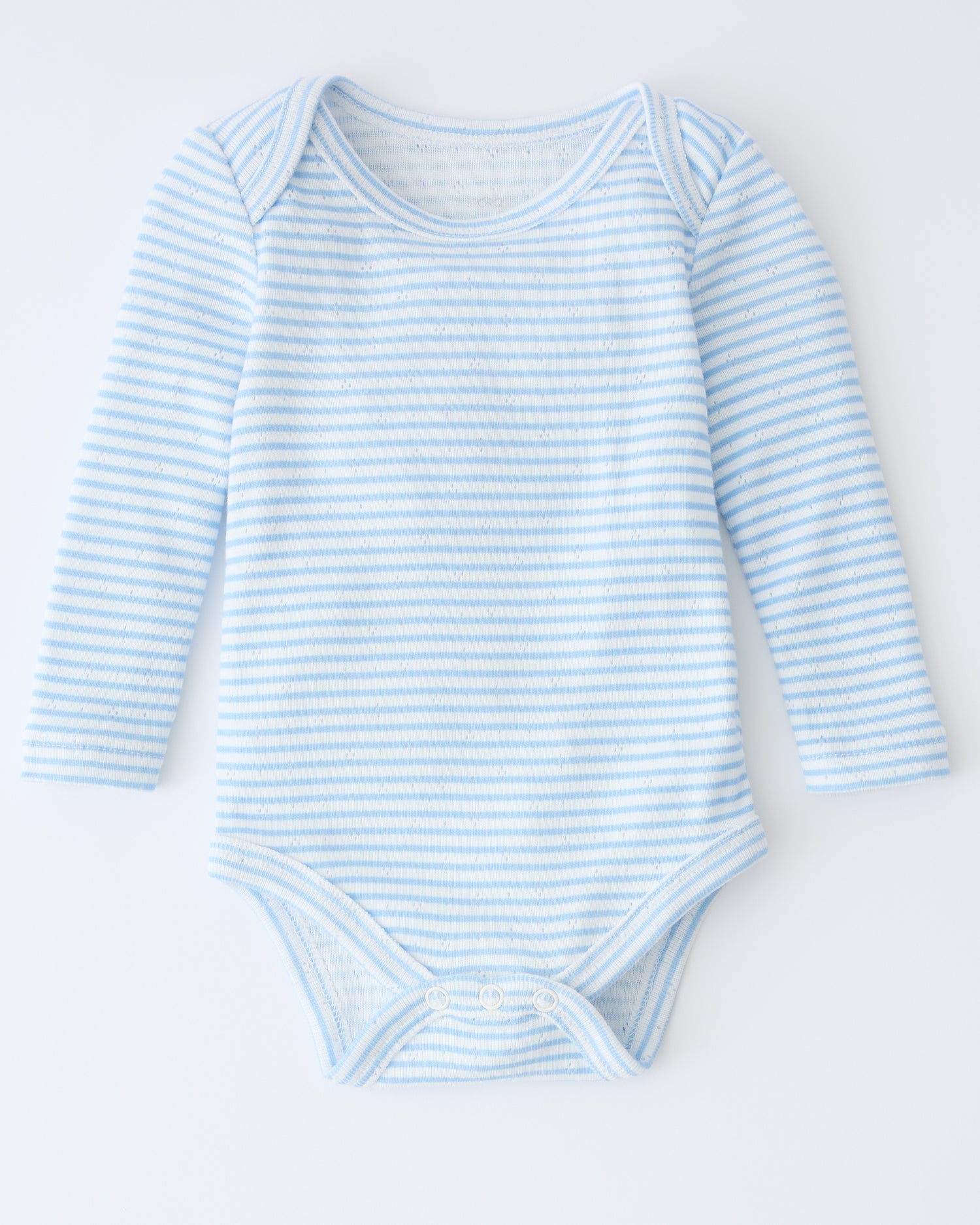Pointelle Long Sleeve Onesie in Blue Candy Stripe on a beige background.