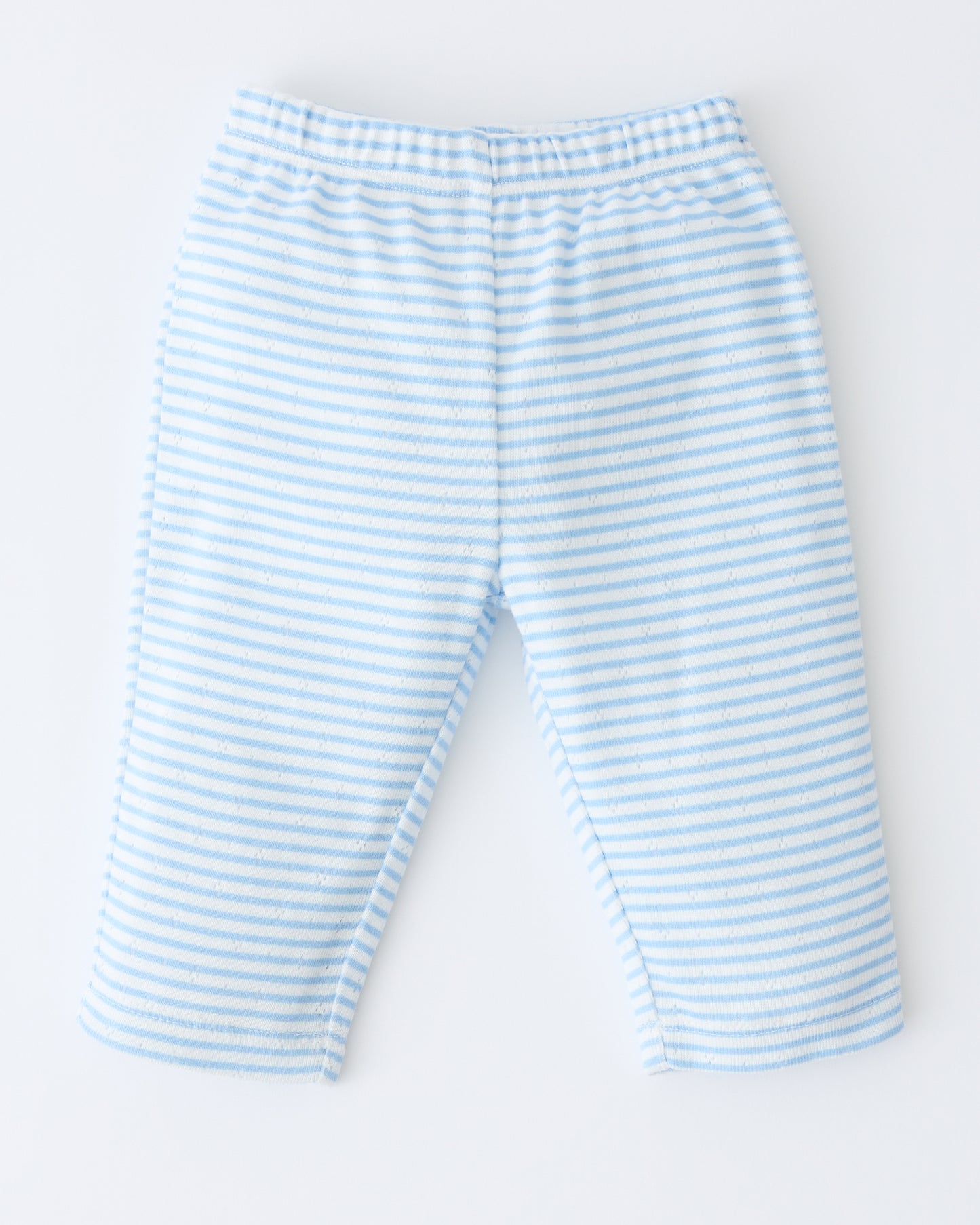 Pointelle Leggings in Blue Candy Stripe on a beige background.