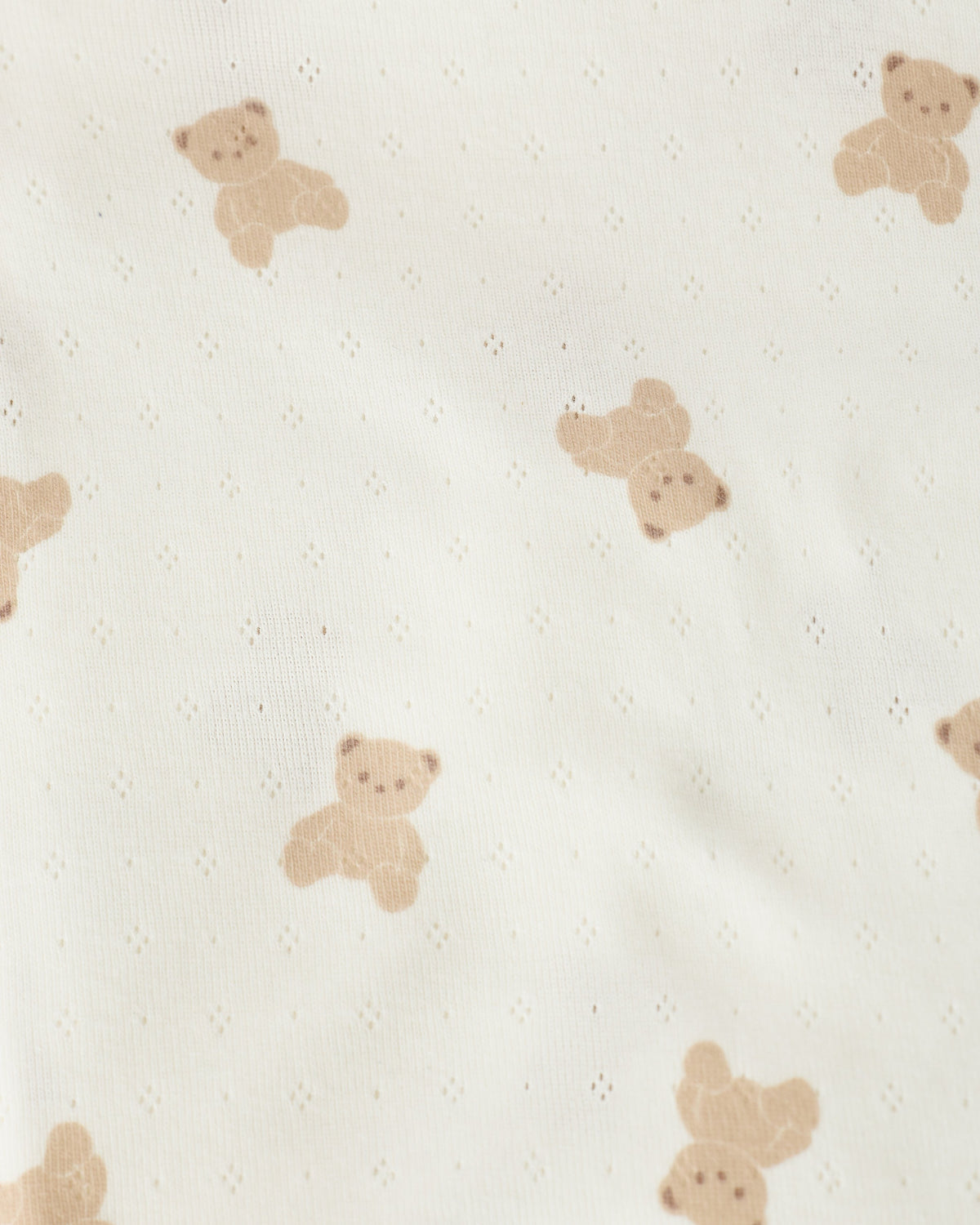 Close up of pattern on the Pointelle Baby Pajama in Ivory Bears pattern.