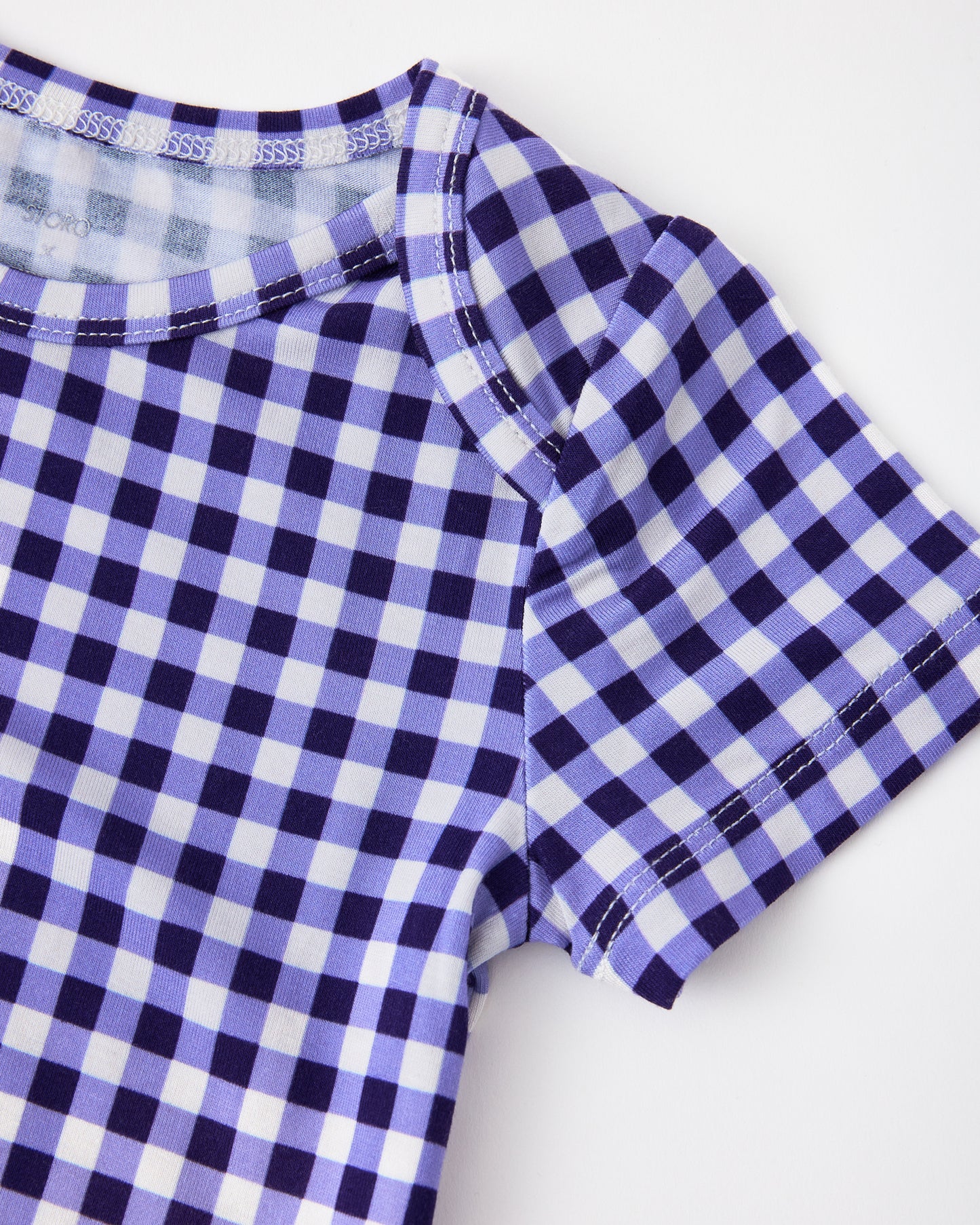 Close up of collar on Baby Onesie Two-Pack in Red & Blue Gingham
