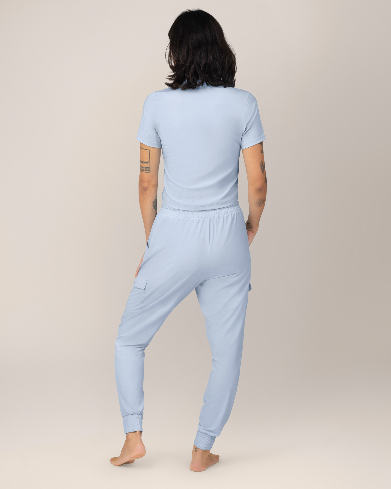 Back view of Model wearing the Remy Maternity & Postpartum Cargo Jogger in French Blue with matching Presley Active Zip Front Nursing Top
