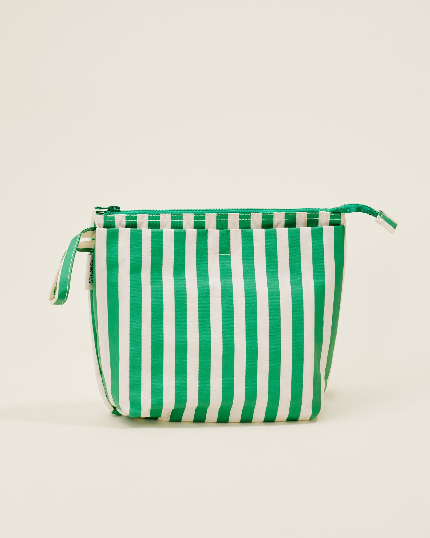 Quick Change Kit Bag in Green Stripe print, on a neutral background
