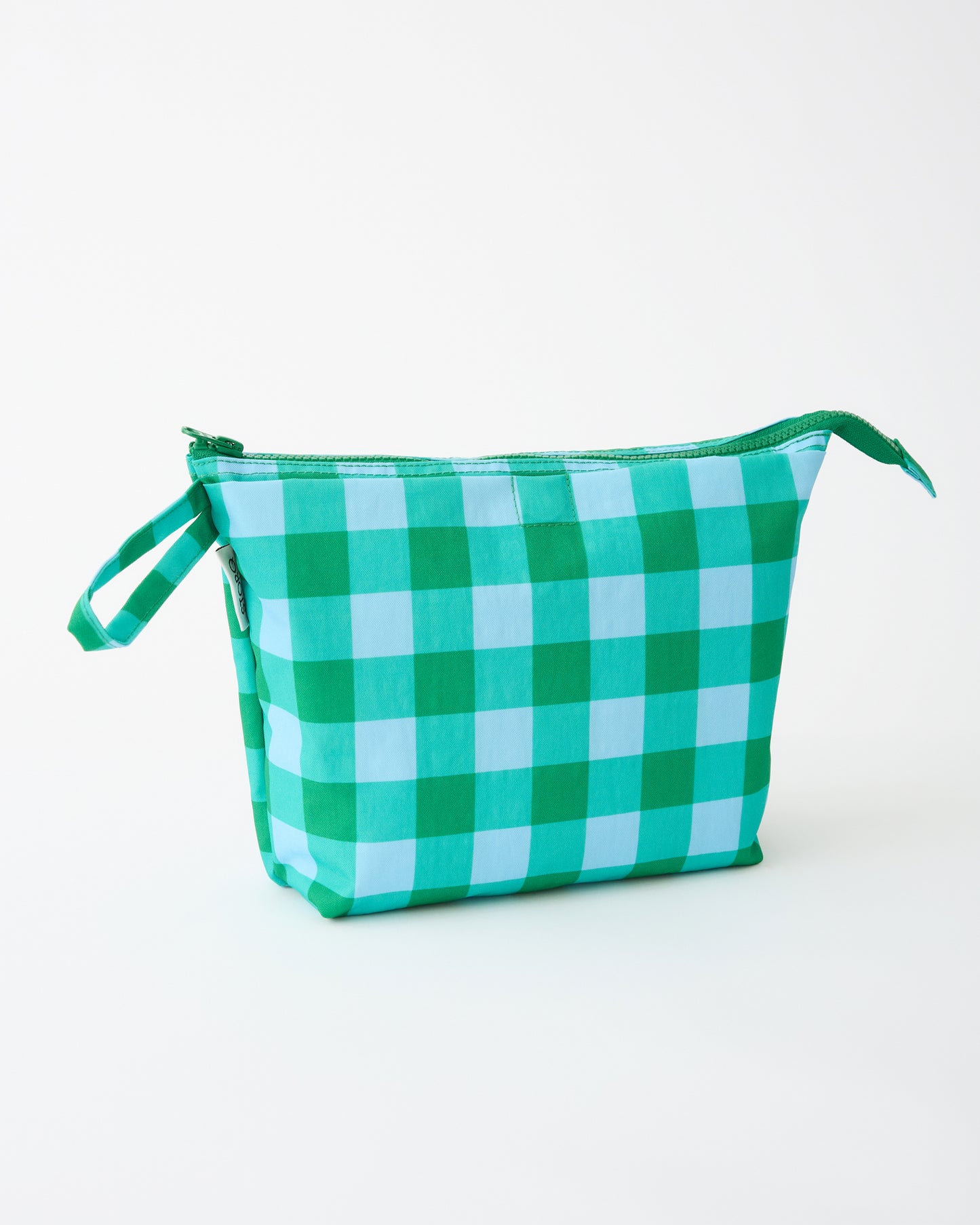 Quick Change Kit Bag in Teal Gingham on a beige background.