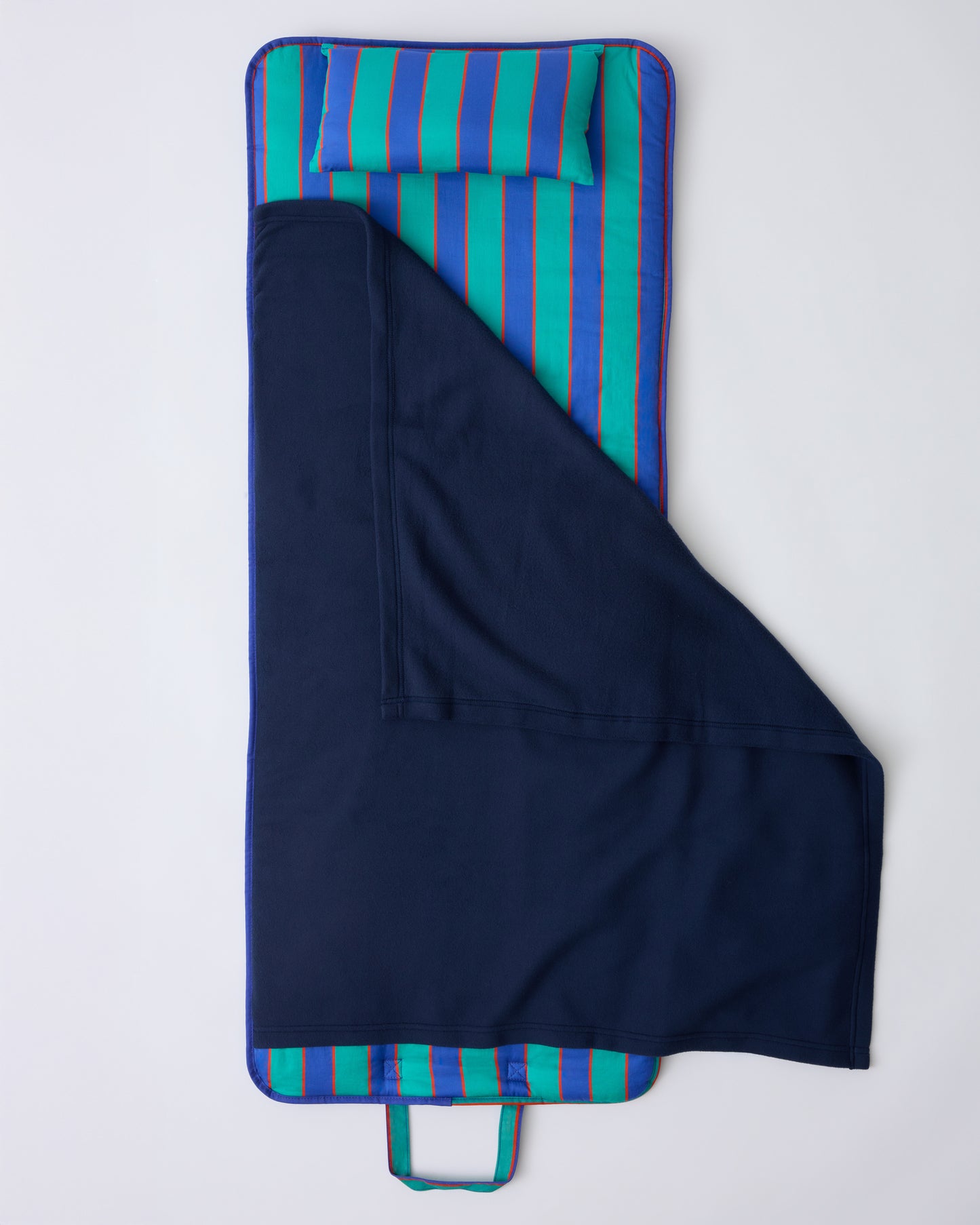 The open flat lay of Cool Kid Nap Mat in Navy & Green Stripe on a beige background.