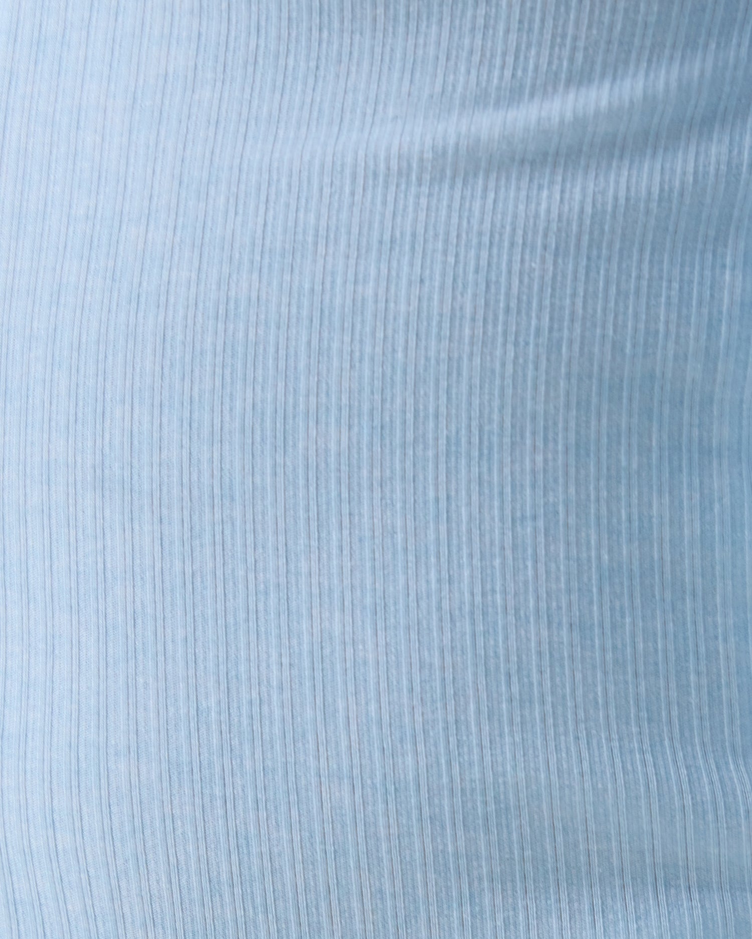 Close up of Baby wearing the Ribbed Bamboo Baby Pajama in Blue Heather