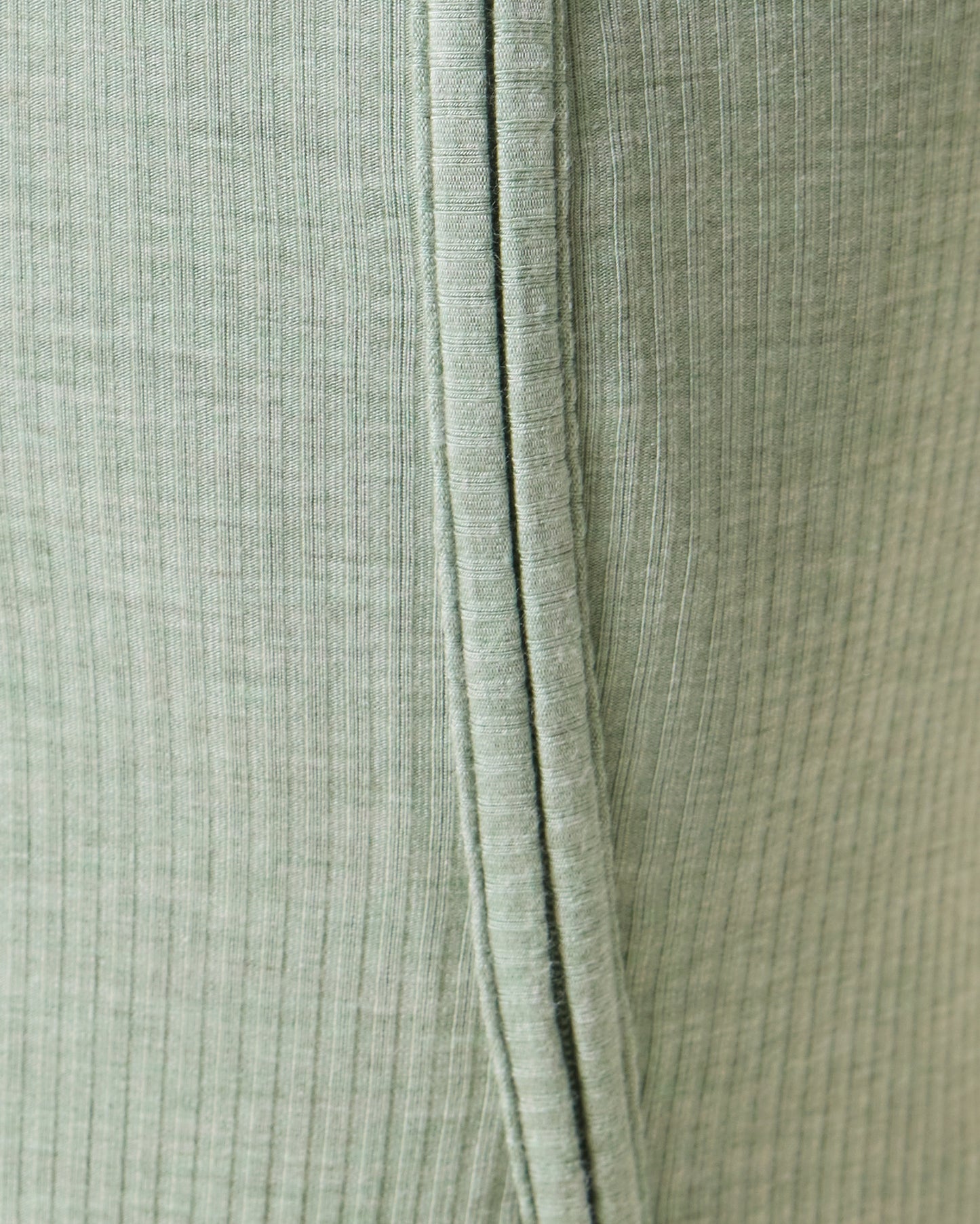 Close up of Baby wearing the Ribbed Bamboo Baby Pajama in Sage Heather